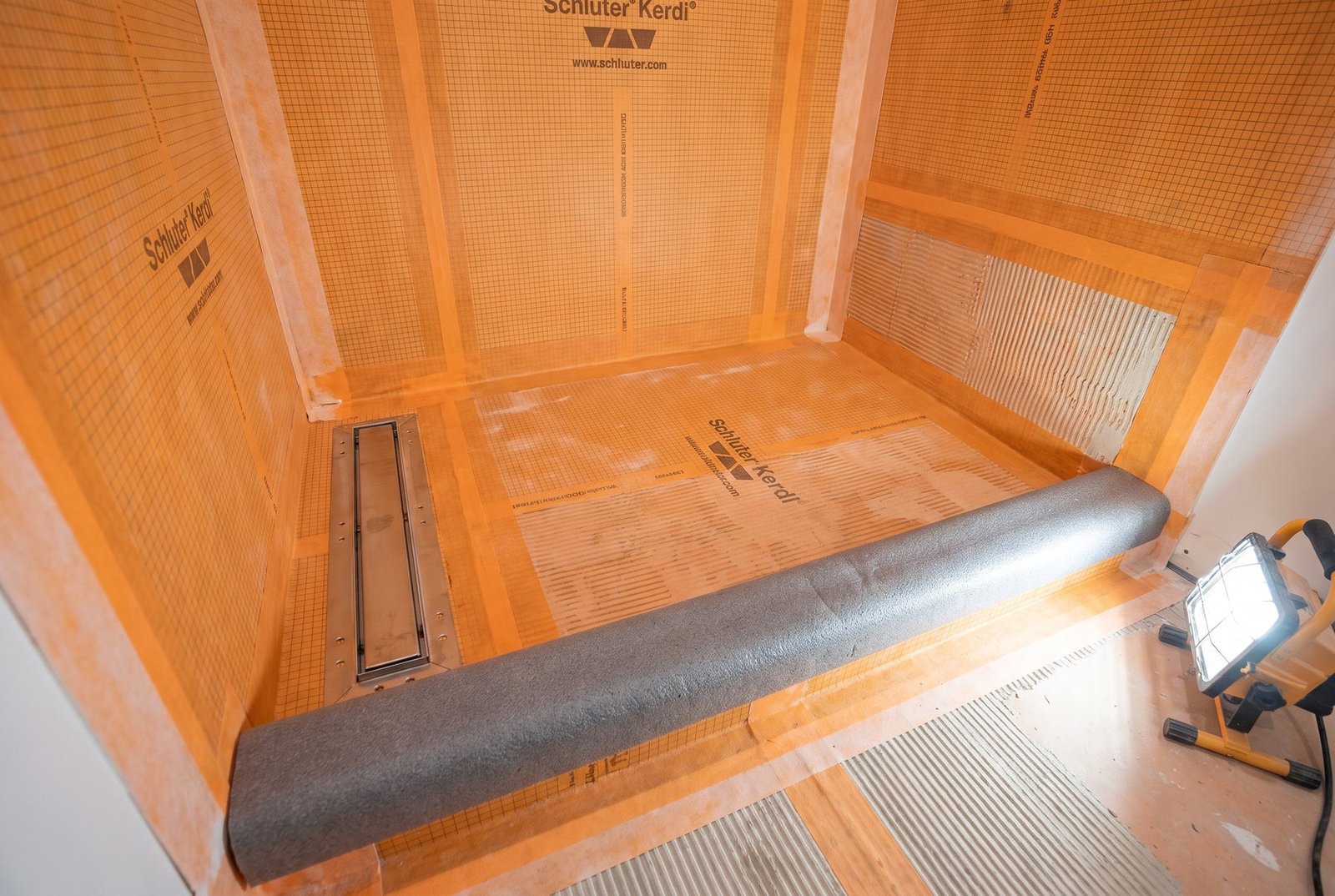 The part you never see: bonded waterproofing membrane and linear drain